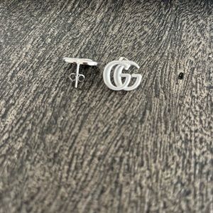 Stainless steel post GG earrings.